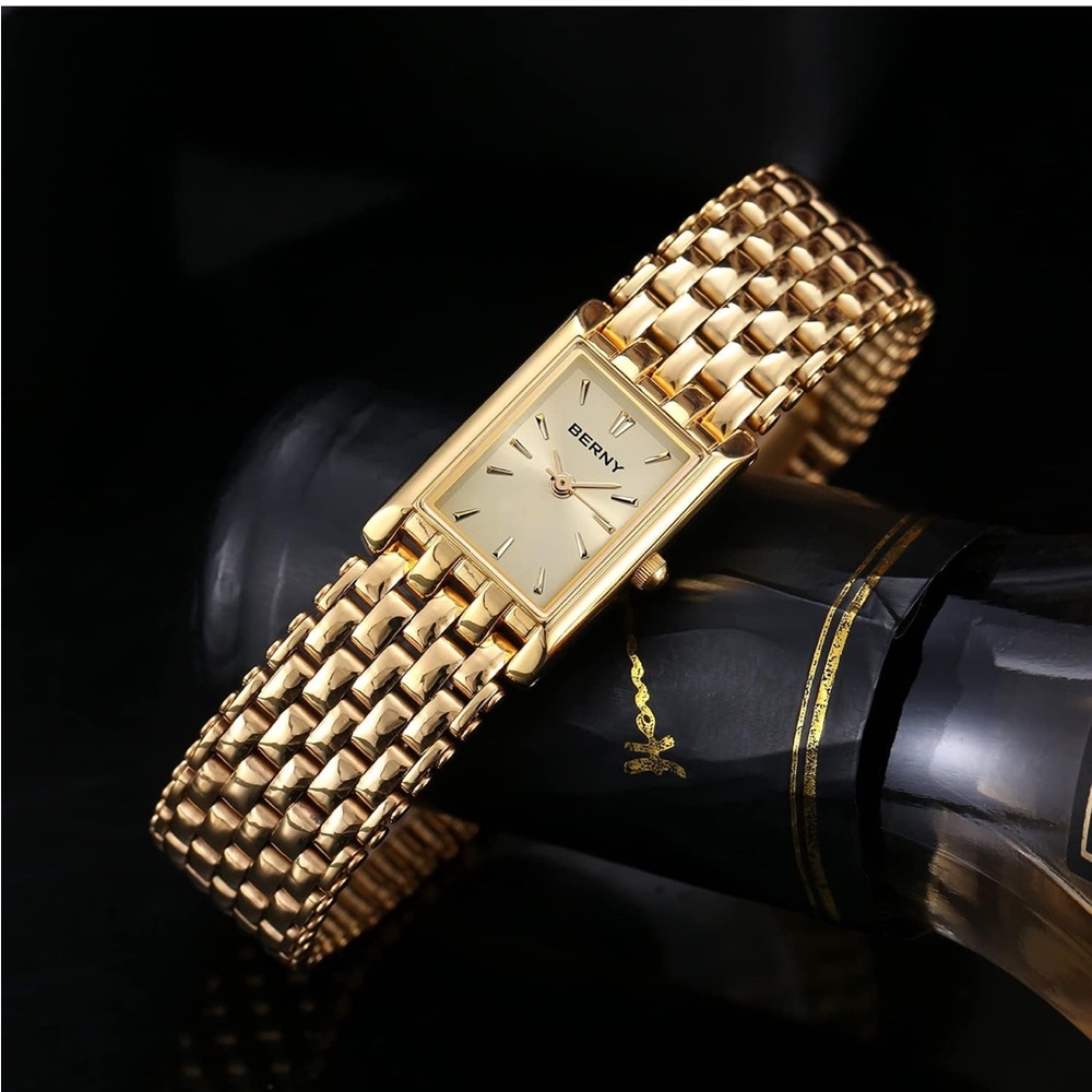 Elegant small gold watch
